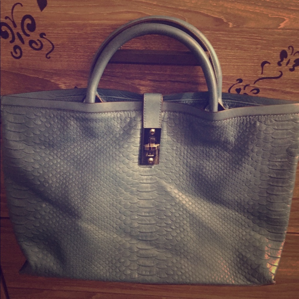 Christian Lacroix Blue alligator handbag.